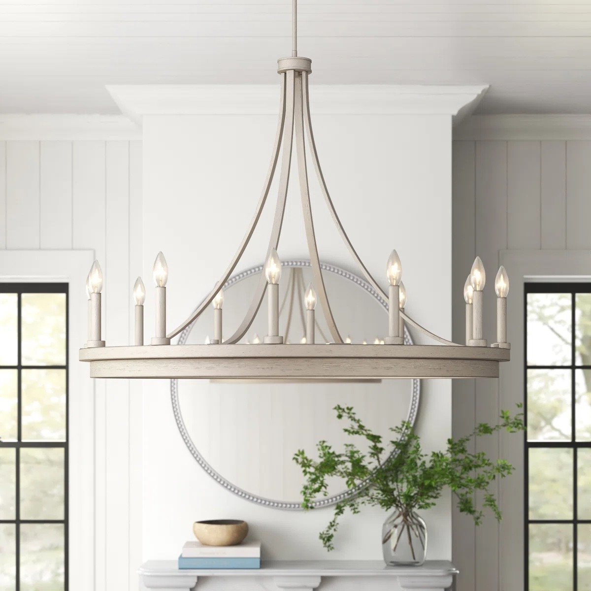 Inspired by modern farmhouse grandeur, the Marconi 12-Light Dimmable Wagon Wheel Chandelier combines dramatic scale, timeless design, and warm illumination to create a stunning focal point. Its circular wagon wheel silhouette and candle-style lighting bring both character and sophistication to any room. ON SALE and under $300.

Keywords:

* Marconi chandelier
* wagon wheel chandelier
* 12 light chandelier
* dimmable chandelier
* farmhouse chandelier
* modern farmhouse lighting
* dining room chandelier
* foyer chandelier
* living room lighting
* statement chandelier
* rustic chandelier
* candle style chandelier
* oversized lighting fixture
* ceiling light fixture
* warm ambient lighting
* luxury farmhouse décor
* high ceiling chandelier
* open concept lighting
* elegant home lighting
* rustic modern interiors

#LTKSaleAlert #LTKHome #LTKSeasonal