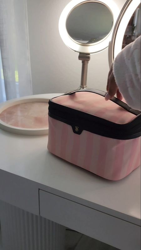 In love with my new Victoria's Secret Express Train Case in Iconic Stripe. It fits all my travel essentials like mists, lotions, makeup, brushes, and more! 

#LTKfindsunder100 #LTKbeauty #LTKVideo