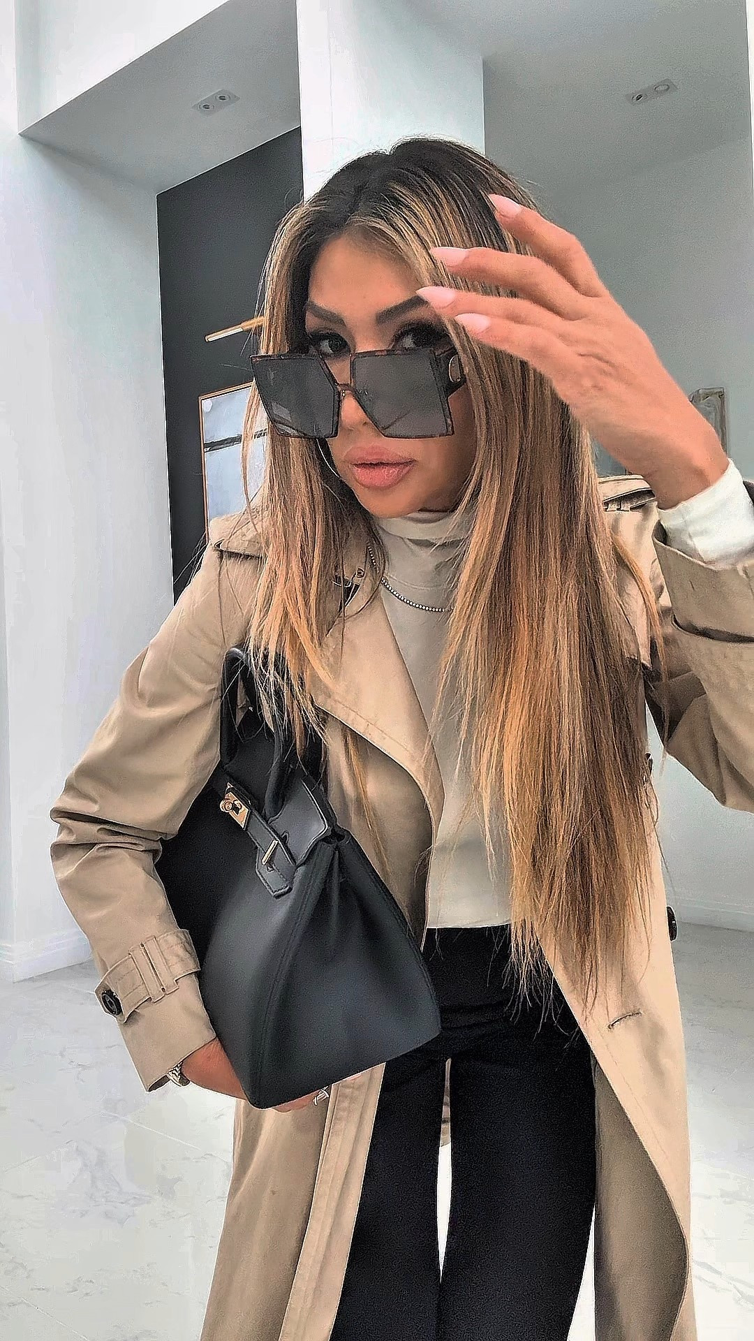 If you want a winter outfit that always looks instantly put-together… start with a trench coat. 🤎
It’s one of those pieces you can style a million ways and still feel polished every single time.

Here are 3 easy ways to wear a trench coat this season:

1️⃣ Classic Neutrals
Cream turtleneck + black pants + structured bag.
Clean, warm, and perfect for everyday.
(What I’m wearing here — TTS on everything!)

2️⃣ All-Black Luxe
Black turtleneck, black trousers, black boots.
The trench breaks up the monochrome and makes the whole look feel expensive.

3️⃣ Casual Weekend Layer
White tee, denim, neutral sneakers, and a crossbody bag.
Effortless, comfy, and still so chic.

Why I love this trench: the fit is slimming, the weight is perfect for layering, and it works for school runs, work, errands, or dinner. It’s the winter neutral staple every closet needs. ✨

Everything is linked for you below — size, fit notes, and color options included. 🤎👇

#LTKootd #LTKWorkwear #LTKOver40
