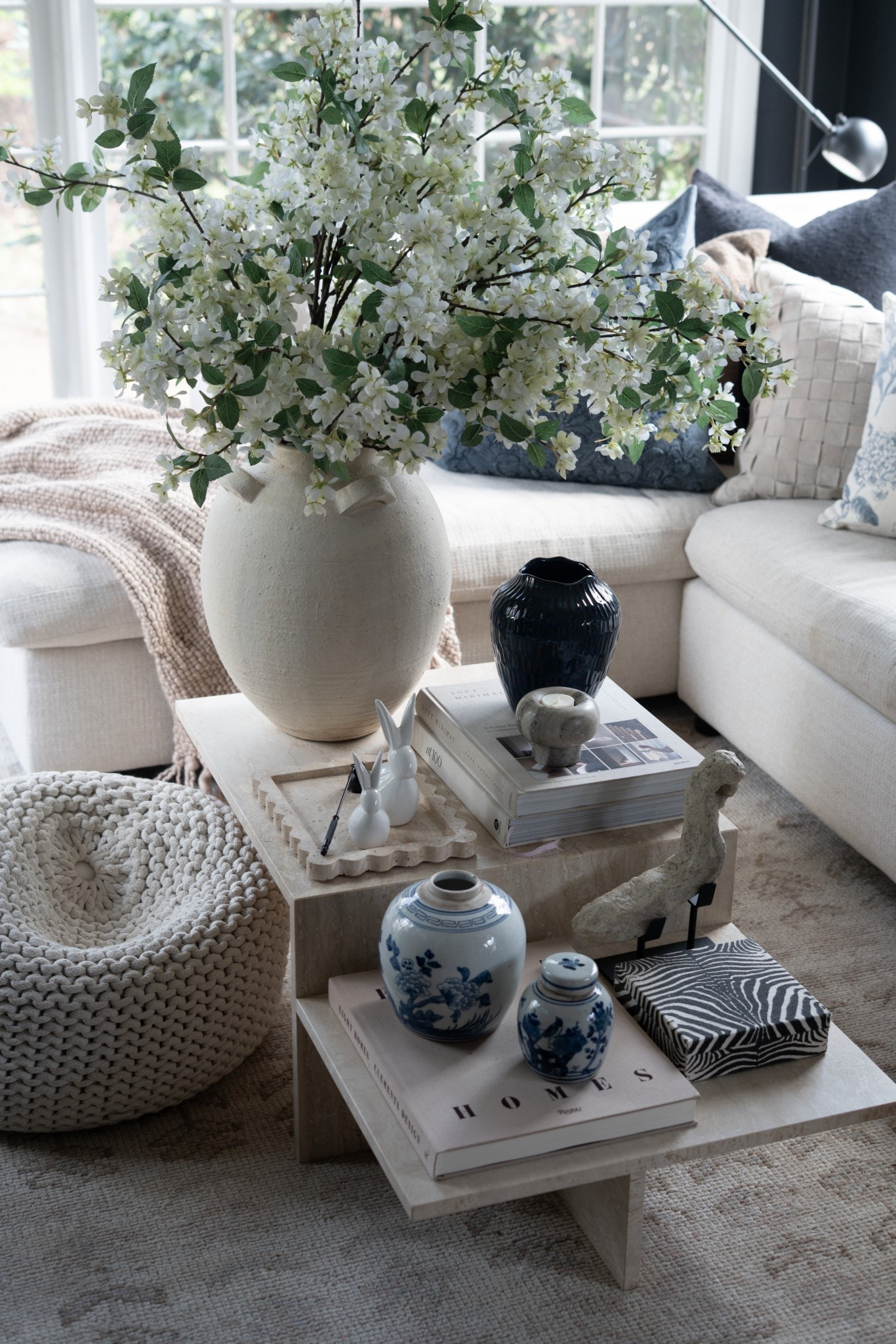 You guys… I cannot even tell you how excited I am about these faux Apple blossoms. The moment they went into this vase the whole room felt like spring had officially arrived. They have that soft, airy, just-picked-from-the-garden look that instantly brightens the space and makes everything feel fresh again. I love how the delicate blossoms spill over the vase and bring so much life to the room without feeling fussy. Paired with the lighter pillows, cozy textures, and sunshine pouring through the windows, it feels like the house just woke up from winter. Honestly, if spring could live in one arrangement… this would be it.


#LTKHome #LTKSeasonal #LTKSpringSale