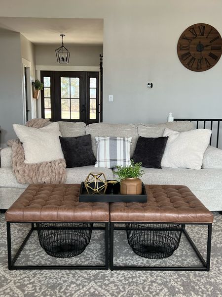 Living room furniture reveal!  Matching couch and loveseat in a light cream color. Ottomans baskets pillows

#LTKhome #LTKSale #LTKsalealert