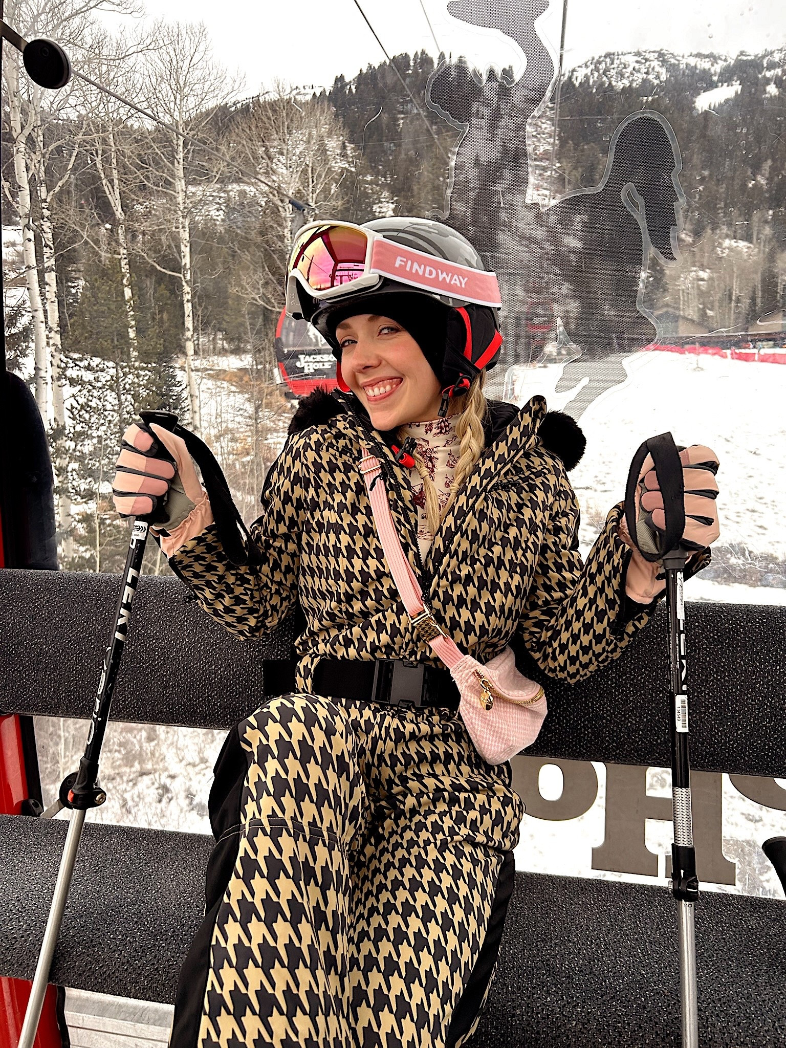 The cutest ski outfit! Linking it on Amazon but if you buy directly, I have a discount code 
Gsousnow.com 
HANS10 at checkout 
Wearing size small

Tan Houndstooth Ski Suit 