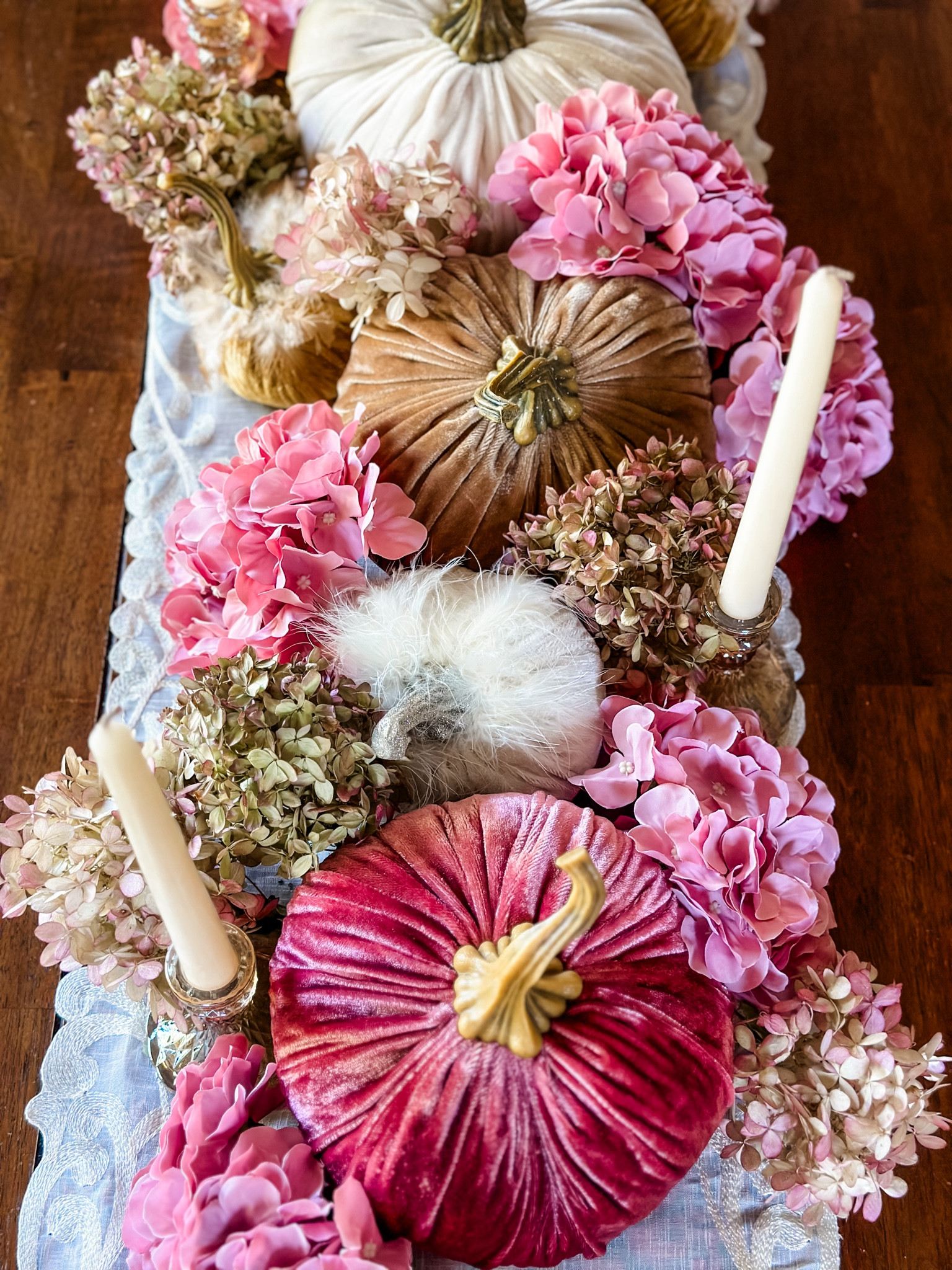 Create a gorgeous centerpiece runner for Thanksgiving with velvet pumpkins and faux hydrangeas 🌸🍂🎀

Table decor 
Table styling 
Holiday table 
Centerpieces 
Arrangements 

#LTKHome #LTKParties #LTKHoliday