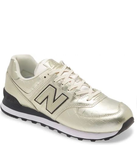 Gold metallic 574 New Balance sneakers. These are super cool for Holiday party or a night out in the City for when you don’t want to walk around in heels , but you still look stylish in these kicks

#LTKCyberweek #LTKshoecrush #LTKunder50