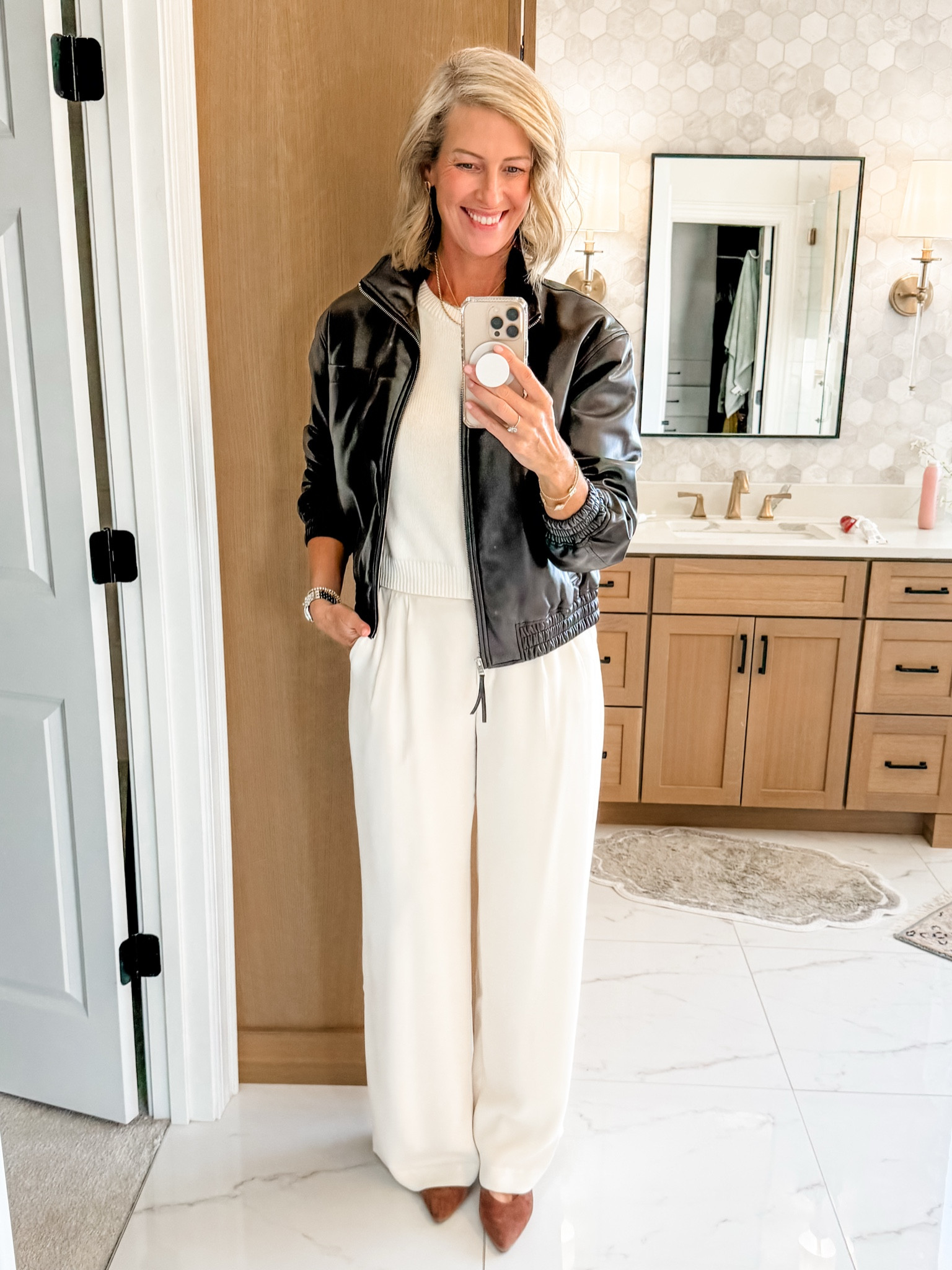 Living in this gorgeous brown leather jacket this fall/winter..dressed it up here for a work meeting and love the contrast with the dress pants 

#LTKSaleAlert #LTKOver40 #LTKWorkwear