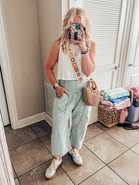 This tank is so cute and I love the fit. I sized down to a small in it. This denim is also super cute and I think I could have sized down but I’m wearing a medium. I size down in adidas gazelles  

#LTKOver40 #LTKTravel #LTKStyleTip