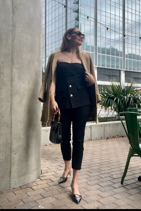 On trend in fall suiting? A strapless top with pants and jacket (usually a blazer but I switched it up here with a camel coat- a timeless piece!) I love that this look is both work and cocktail ready! #investmentpuece 

#LTKworkwear #LTKSeasonal #LTKstyletip
