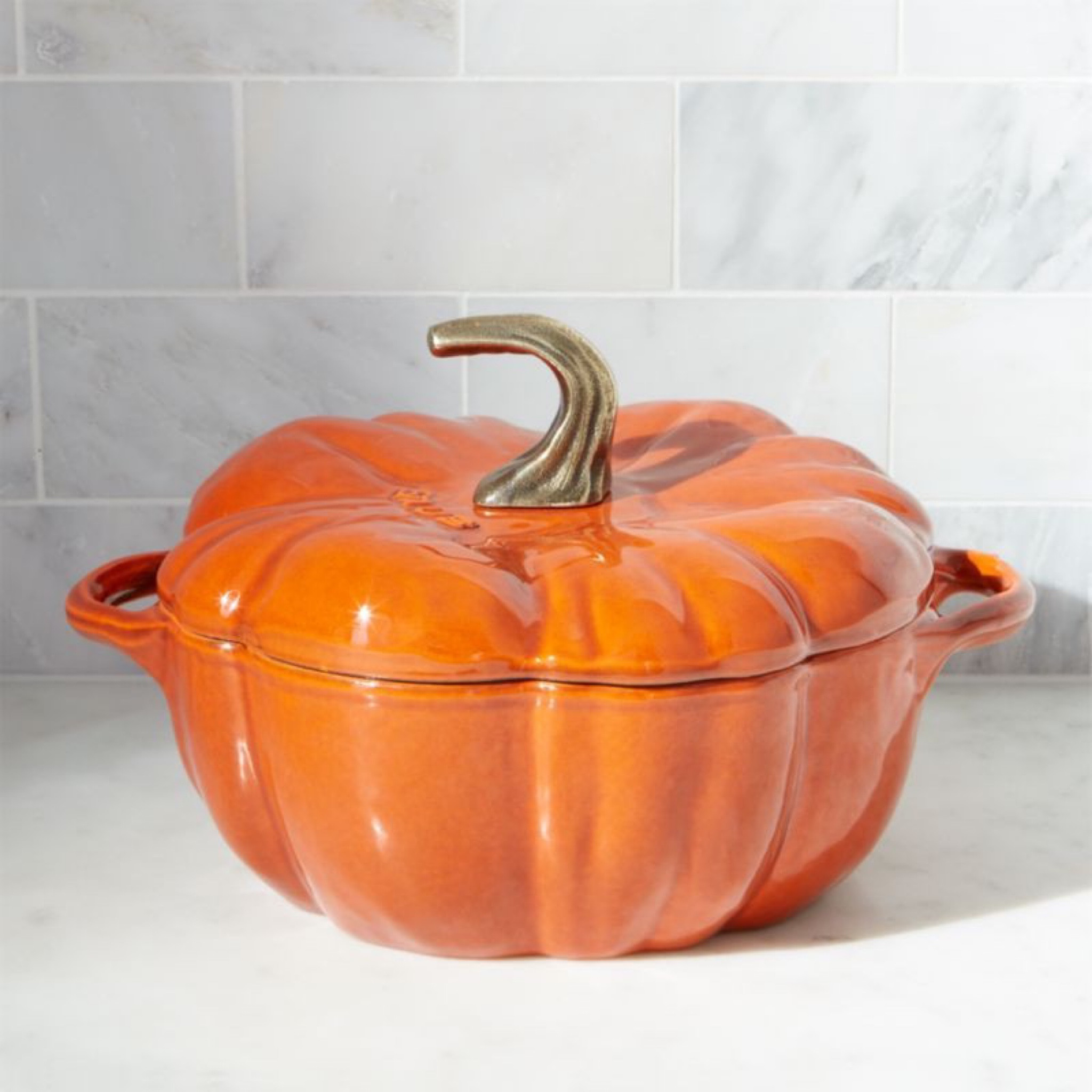 Staub 3.5 qt cast iron pumpkin crock pot cocotte for pumpkin soup, stews or cider! 

#LTKHalloween #LTKSeasonal #LTKhome