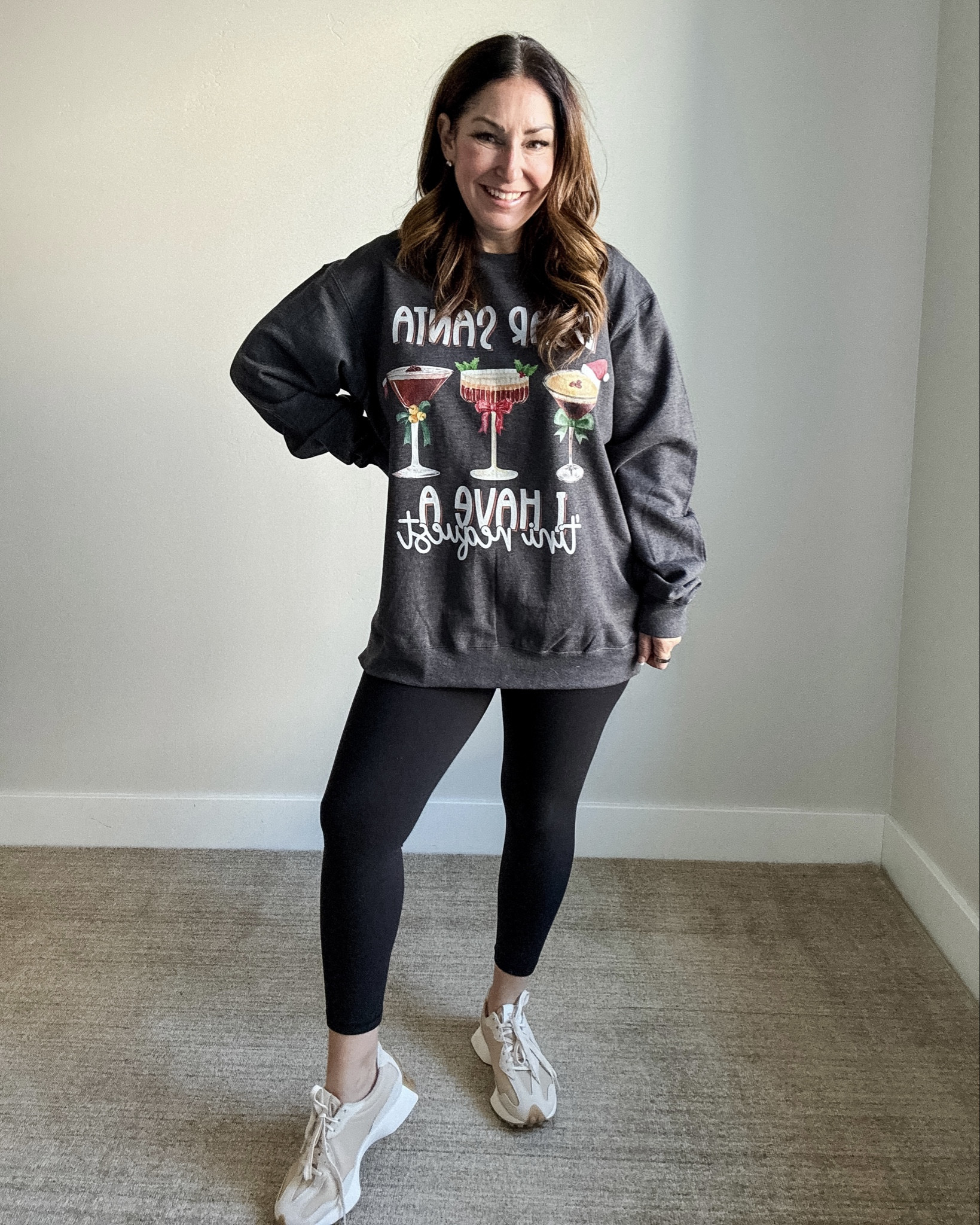Festive graphic sweatshirt from Amazon paired with black leggings and sneakers. #holidaystyle #amazonfinds | Wearing L in top and leggings 

 

#LTKHoliday #LTKSeasonal #LTKMidsize