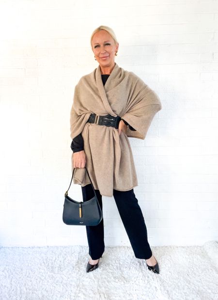 A sophisticated way to style a cashmere wrap for autumn is to drape it over your shoulders and secure it in place with a belt. This keeps the wrap from moving and is especially helpful on a windy day.

#LTKover40 #LTKSeasonal #LTKstyletip