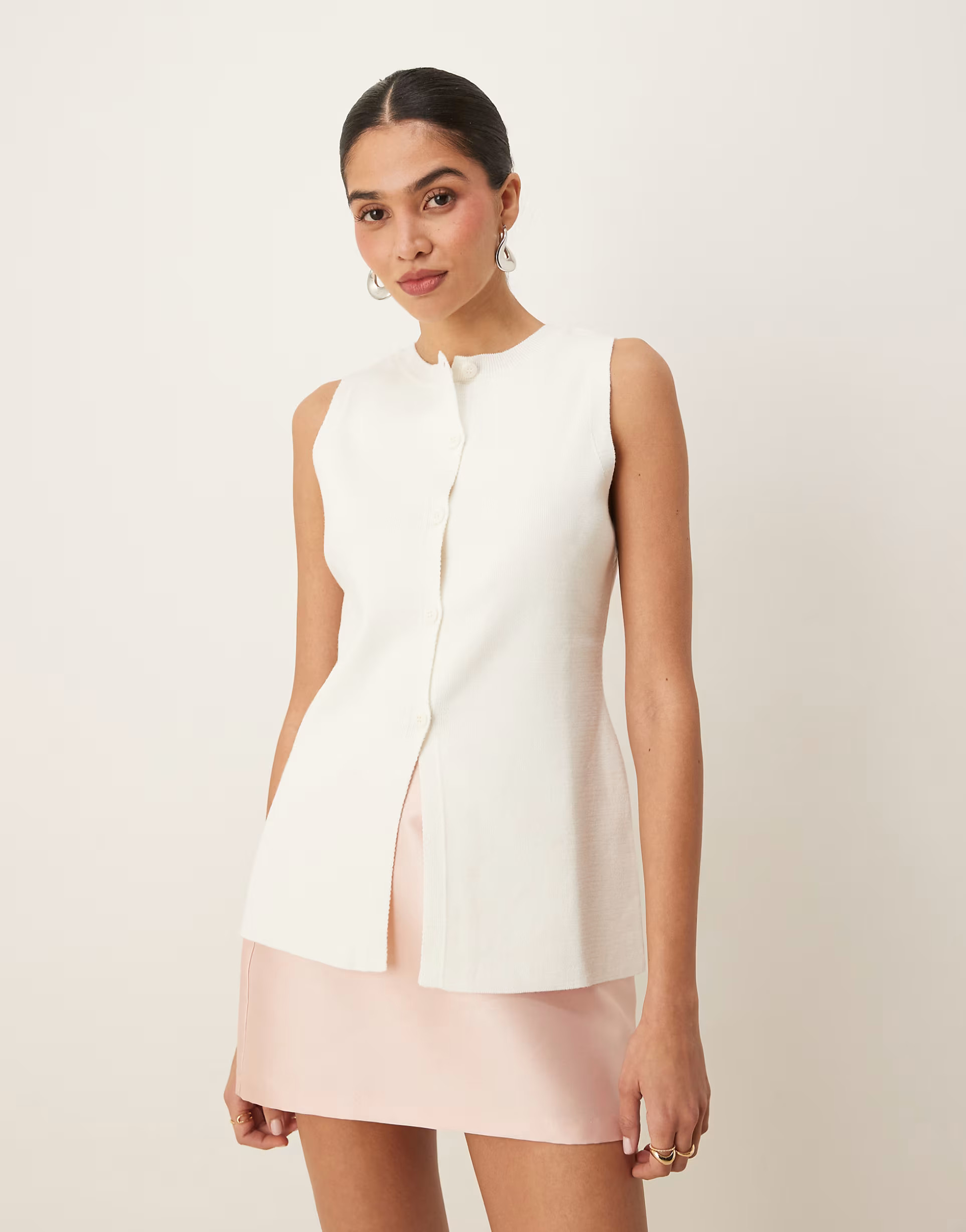 ASOS DESIGN knitted crew neck waistcoat with front split in white | ASOS (Global)