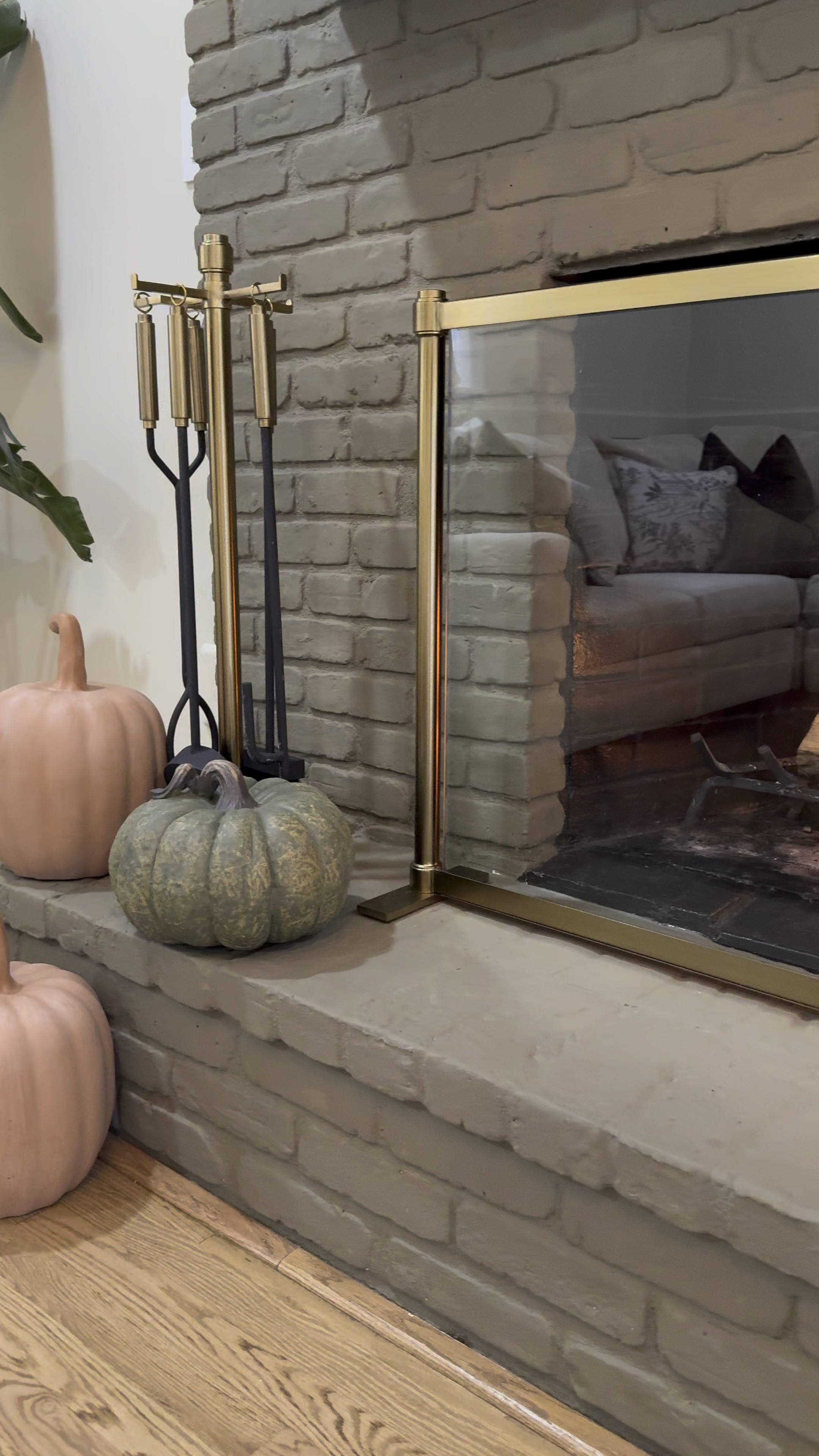Glass fireplace screen and tools in antique brass from Pottery Barn 🪵✨

#LTKHoliday #LTKVideo #LTKHome