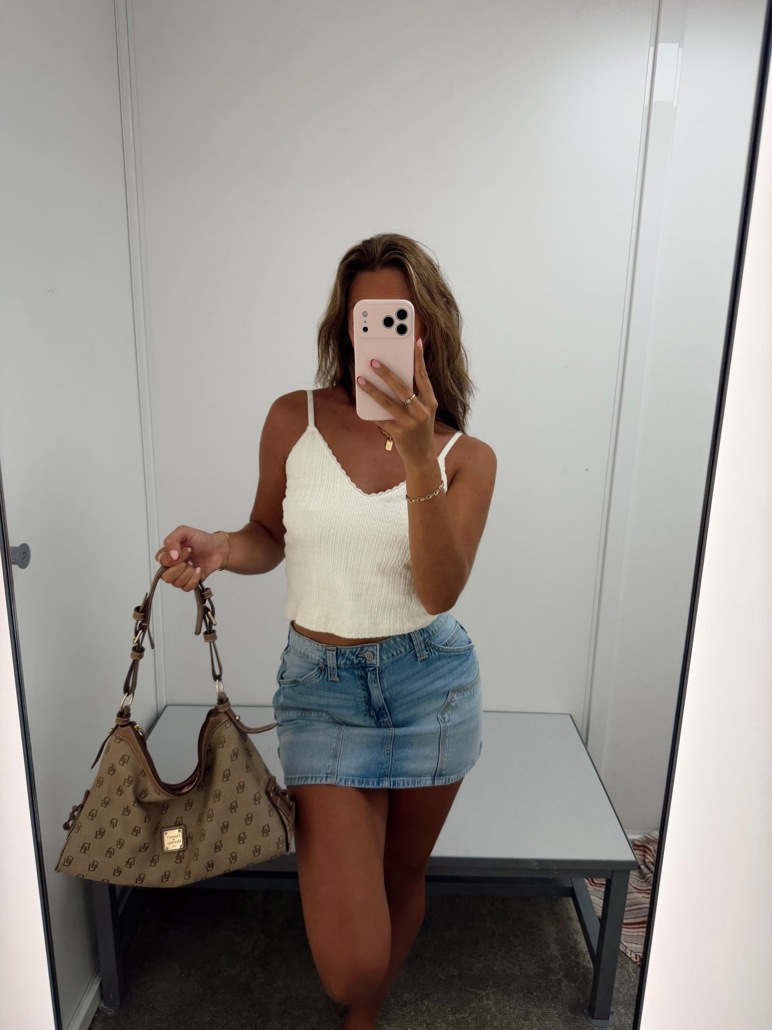 Obsessed is an understatement🤭 this denim mini skirt is too cute- and the best part? It’s from Walmart for under $15 (!!). I’m 5’10 160 and I’m wearing a size L. I styled it with a simple cream tank and my vintage Dooney & Bourke brown monogram hobo, which never fails to get compliments. She’s THAT girl🤎👜


#LTKootd #LTKMidsize #LTKTall