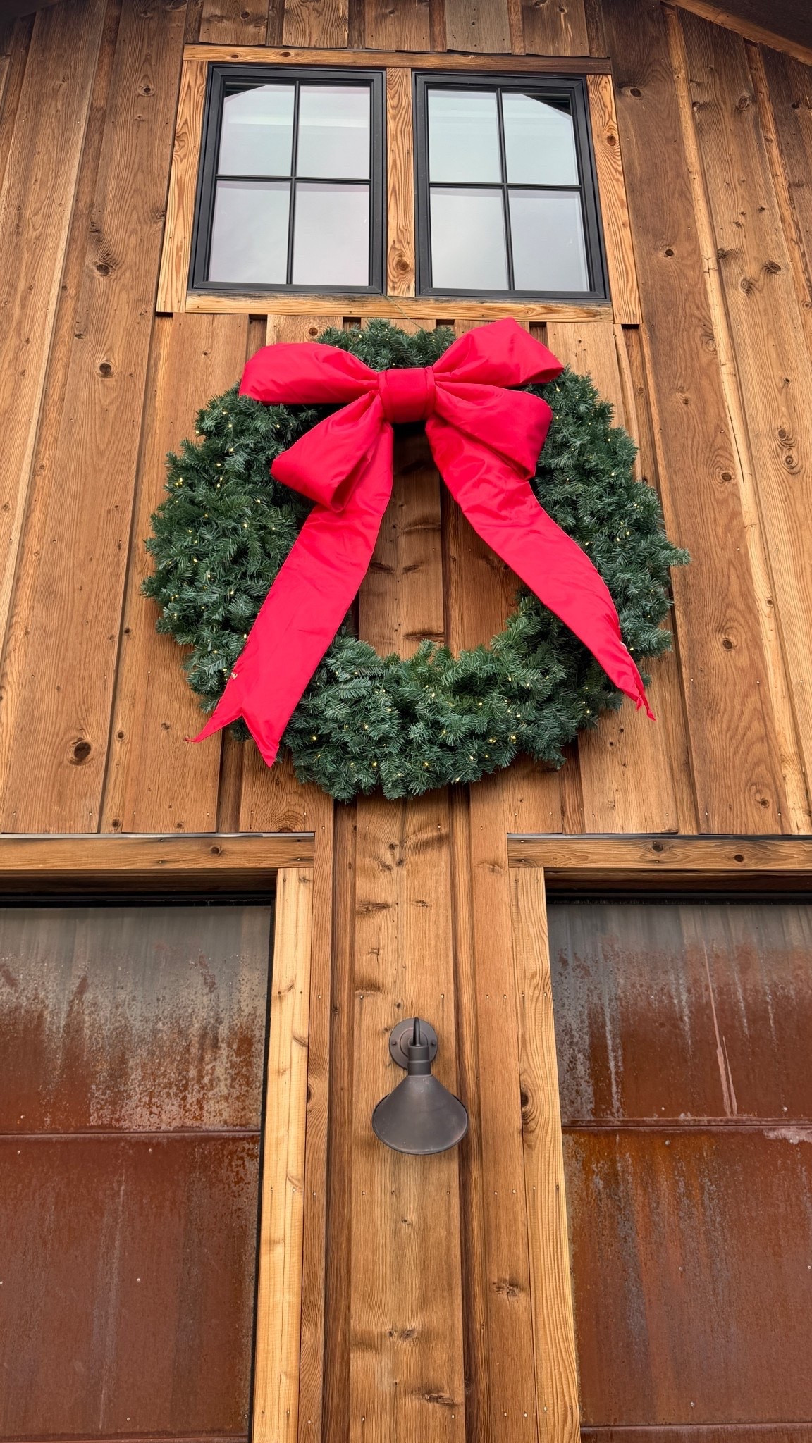 Going BIG with Christmas decor this year! 🎄🎀

An XL Christmas wreath paired with an oversized ribbon is such an easy way to make your home’s exterior feel festive and welcoming. I love how just two statement pieces can completely transform a front door, porch, or entryway.

If you love that classic, beautifully decorated Christmas look, these oversized accents are definitely worth adding. ❤️✨

#LTKHome #LTKSeasonal #LTKmomlife