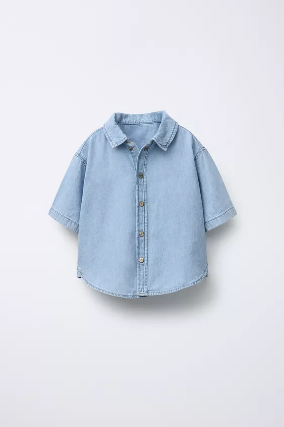 Denim shirt with collared neck and short sleeves. Front snap button closure.Light blue | 4441/770... | Zara US