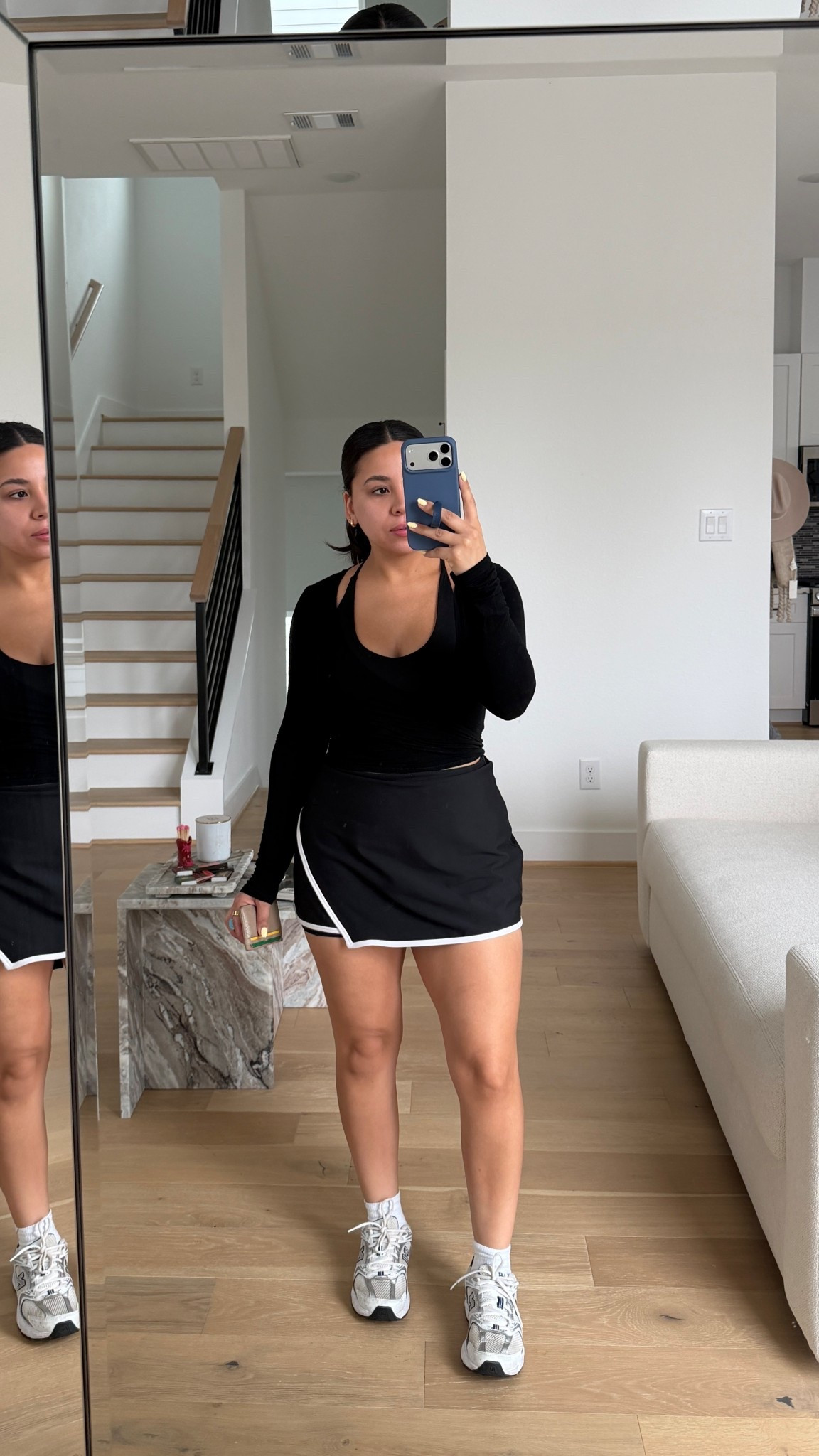 Wrap: small
Skort: small
Sports bra: small
White socks 
Sneakers: 4.5 men 

#LTKActive #LTKgrwm #LTKootd