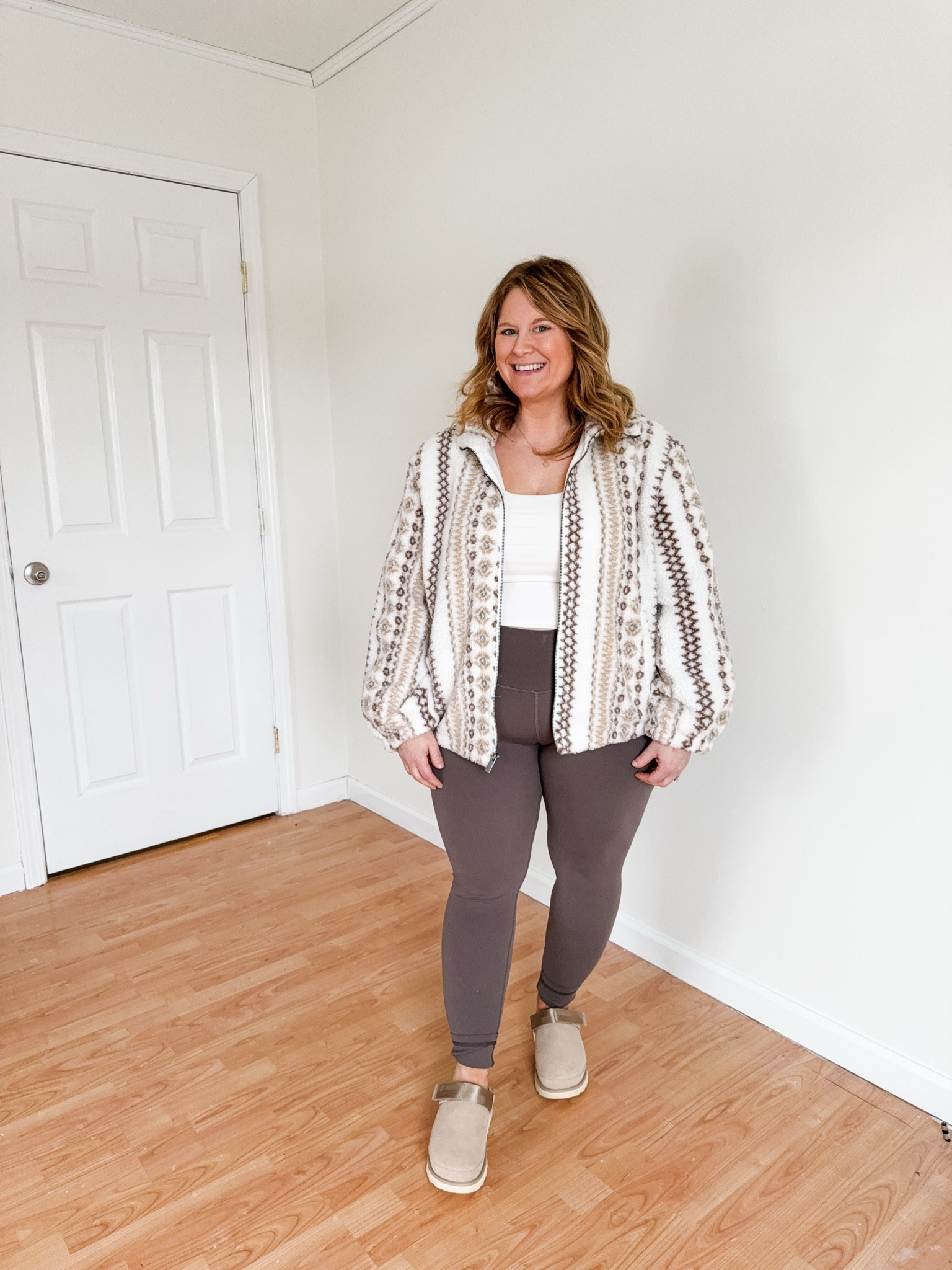 Wearing an XL in my printed sherpa - is a little tight on my belly when zipped so returning.  Wearing an XL in my tank and leggings 

#LTKActive #LTKMidsize #LTKFindsUnder50