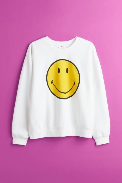 Conscious choice  Smiley® x H&MNew ArrivalSmiley® x H&M. Relaxed-fit sweatshirt with a printed ... | H&M (US + CA)