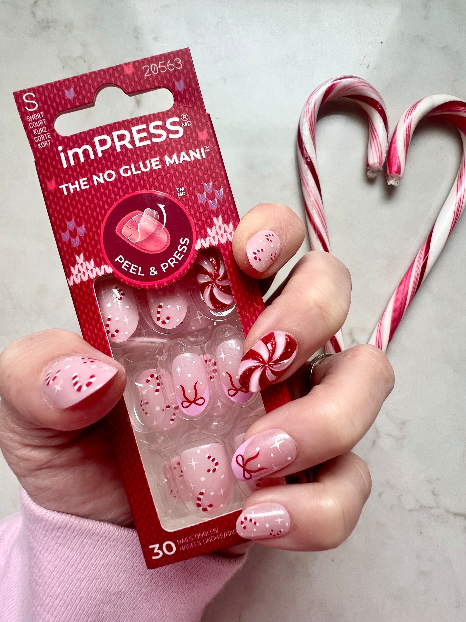 ❤️🩷🤍 the CUTEST Christmas candy cane press on nails!! Style : Be Merry #impress #nails 

#LTKHoliday #LTKGiftGuide #LTKgrwm