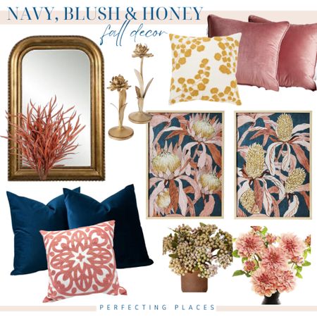 Loving this navy, blush, and honey gold color scheme for fall decor. Gold mirror, gold metal flower taper candle holders, gold embroidered pillow, blush velvet pillows, navy pillows, floral artwork, pink embroidered pillow, fall berries, faux dahlias.

#LTKhome #LTKstyletip #LTKSeasonal