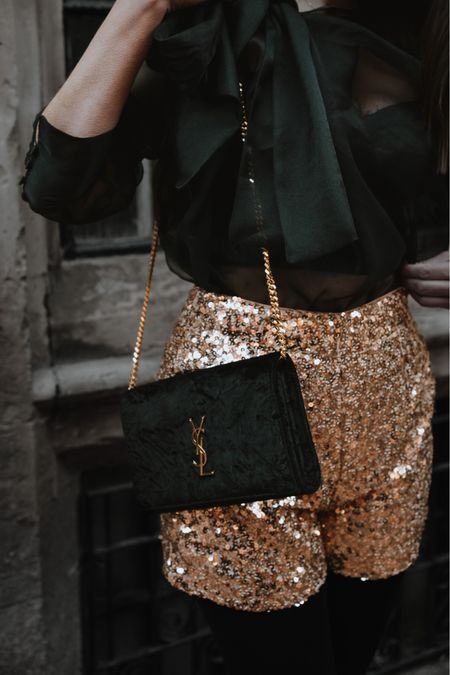 New Years Eve ready with my black YSL Kate / wallet on chain bag, gold sequin shorts from Karen Millen and a bow black organza blouse. Finished with Jimmy Choo Karter boots (fit true to size). ✨

#nyeoutfit #partyoutfit #ysl #yslbag #sequinoutfit #eveningoutfit 

#LTKHoliday #LTKSeasonal #LTKstyletip