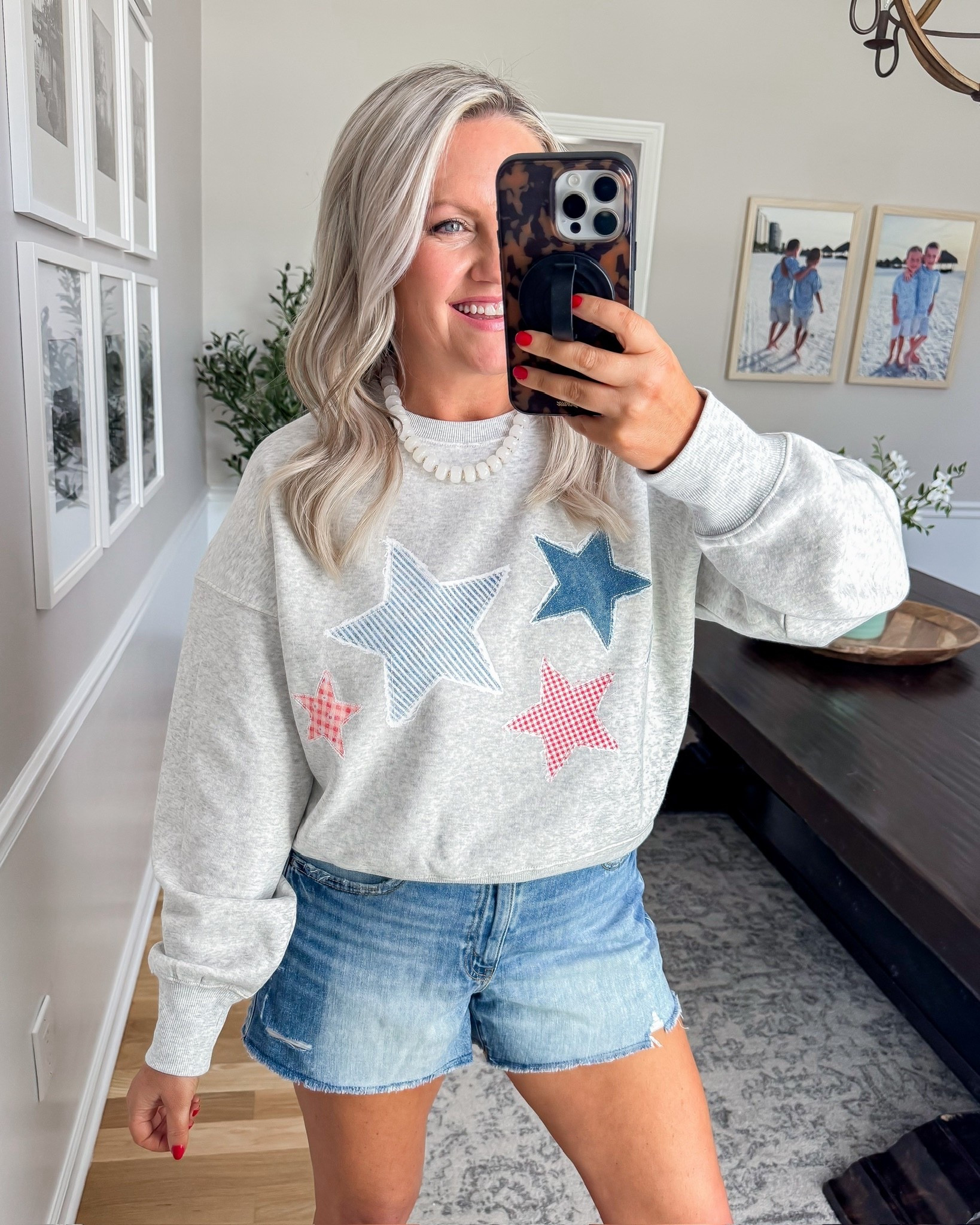 This one just screams summer weekends 🇺🇸 The star detail is so fun and festive without trying too hard, and it’s the perfect lightweight layer for cooler mornings or nights.

patriotic outfit star sweatshirt casual summer outfit denim shorts everyday look 4th of july outfit comfy style weekend outfit easy casual look summer layering lovelylifestyling 

#LTKOver40 #LTKSeasonal #LTKootd