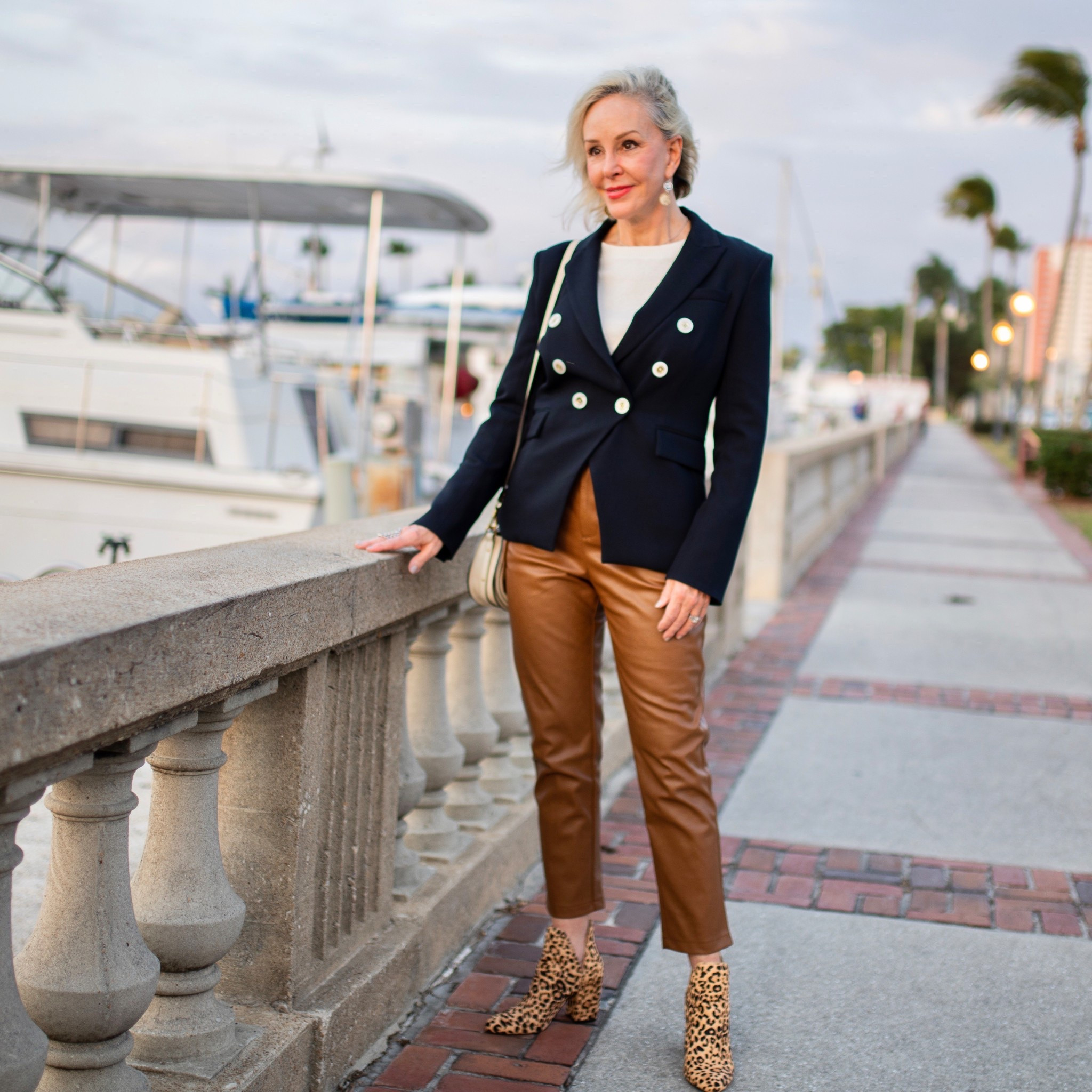 Navy or black blazer
Over faux leather pants in caramel 
Leopard booties 
White long sleeve basic tee shirt  wardrobe staple 

#LTKOver40 #LTKWorkwear #LTKFindsUnder100
