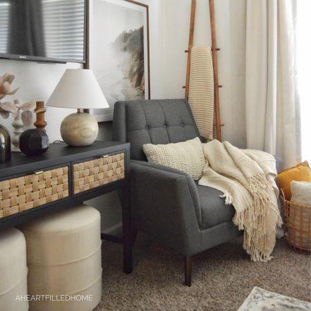 Master bedroom makeover including a new accent chair, curtains, area rug, console table, artwork, wall art, table lamp, ottoman, and more!

#LTKfindsunder100 #LTKfindsunder50 #LTKhome
