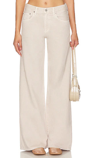 Clara Low Rise Baggy Flare in Tusk | Revolve Clothing (Global)