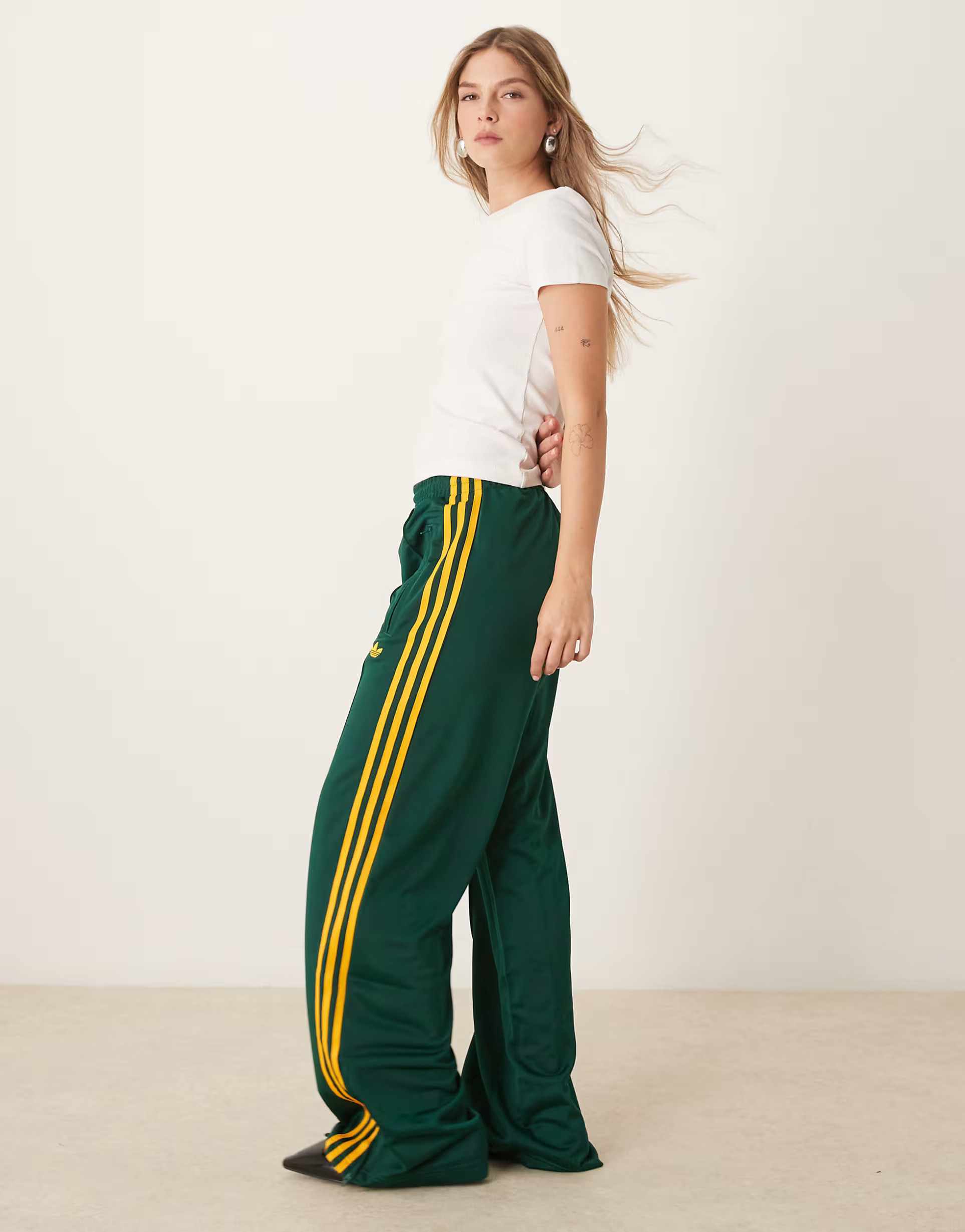 adidas Originals Firebird Loose track pants in green | ASOS (Global)