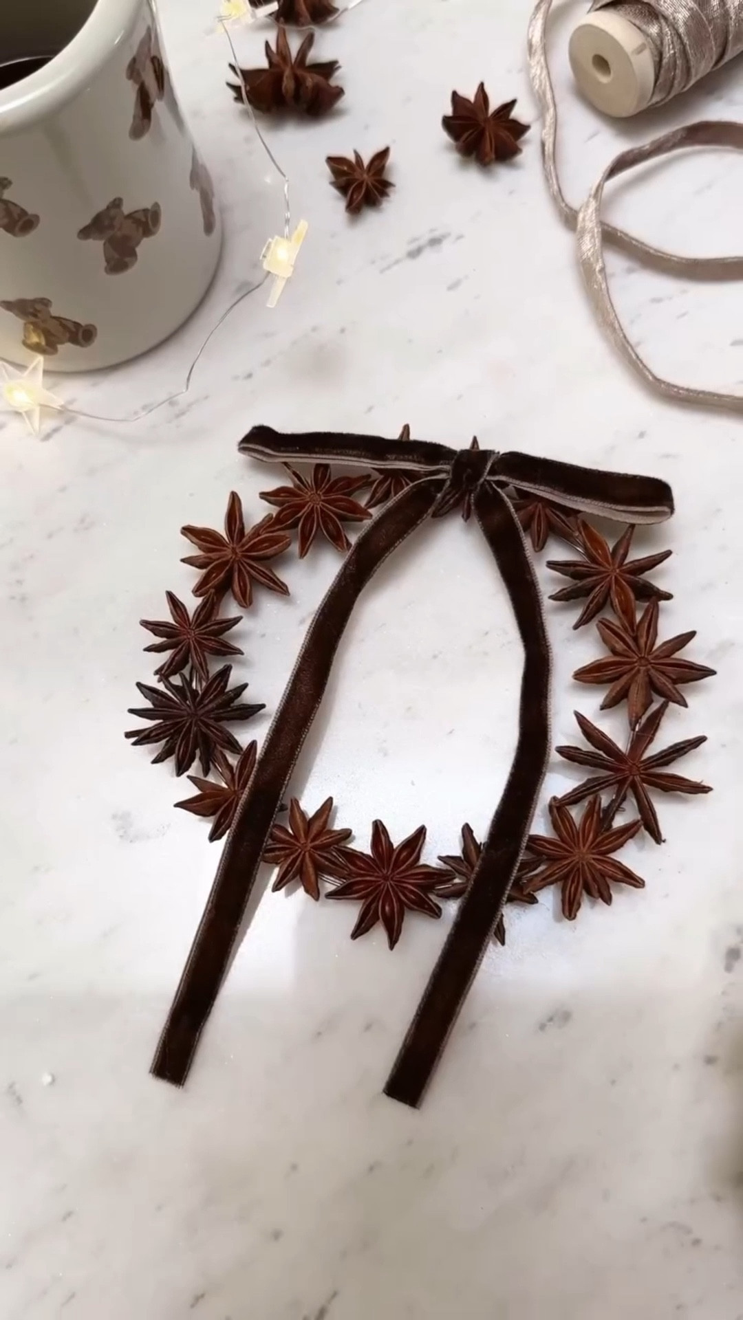 This DIY star anise wreath might be my favorite project yet. It smells amazing, looks timeless, and brings that cozy old-world charm to your holiday decor. All you need is floral wire, dried star anise, and a soft brown velvet ribbon — the perfect mix of rustic, elegant, and handmade.

diy christmas wreath, star anise wreath, neutral christmas decor, organic modern christmas, modern cottage christmas, rustic holiday decor, european inspired christmas, old world christmas, natural christmas wreath, velvet ribbon wreath, cozy christmas home, scandinavian christmas, minimalist holiday decor, timeless christmas style, pottery barn christmas, lulu and georgia christmas, handmade holiday decor, cottage christmas, cozy winter home, diy holiday crafts

#LTKSeasonal #LTKHome #LTKHoliday