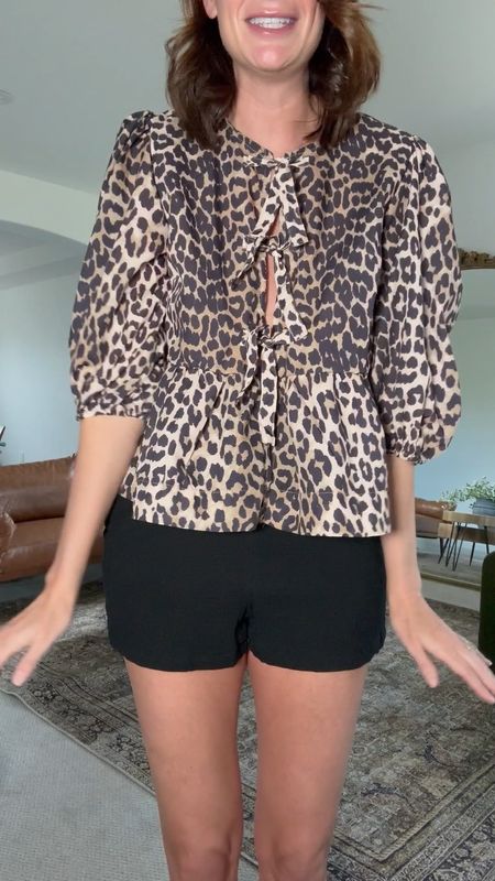 This is the cutest, tie front, designer inspired top from Amazon! Love the shape and fit of it! Comes in solid colors too! 

#LTKFindsUnder50 #LTKVideo #LTKStyleTip