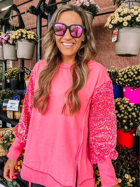 I like pink - sweatshirts! How much fun is this??? Perfect Barbie inspired look! Fun sparkly sleeves and oh so comfortable! Perfect for this chilly weather! Fall outfit • chic outfit • fancy sweatshirt • leggings • red dress boutique 

#LTKSeasonal #LTKover40 #LTKfindsunder100