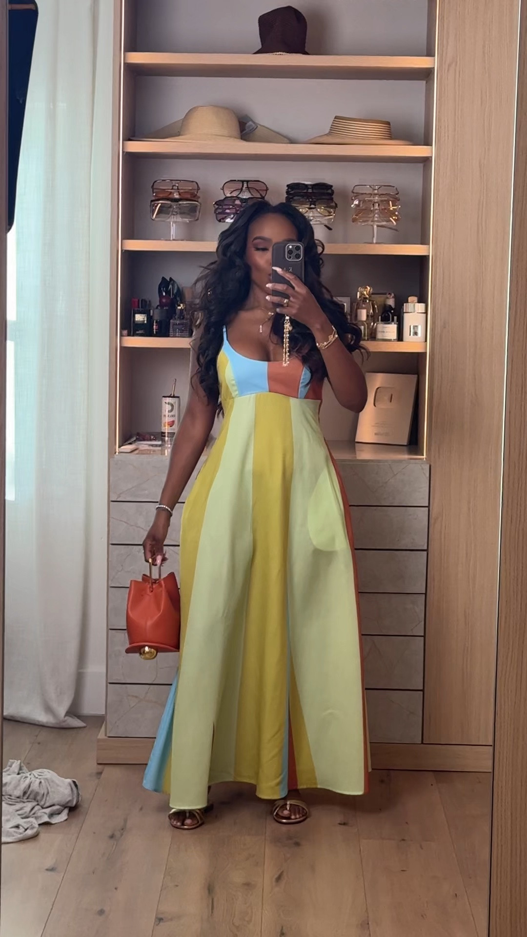 Hi babes! 

Okay this colorblock maxi is SUCH a statement piece and exactly the kind of dress that makes people stop scrolling. The pastel tones mixed with the flowy silhouette give that elevated vacation energy while still feeling playful, feminine, and effortless.

I paired it with the orange structured bag because it pulls the warm tones together SO well and gives the outfit that luxury-inspired styling moment without overcomplicating the look. This is one of those dresses that does all the work for you.

Where to wear this:
• Vacation dinners
• Resort nights
• Beachside brunch
• Summer parties
• Tropical getaways

Affordable statement pieces paired with elevated accessories always create the best high-end look while keeping the outfit wearable and versatile. The cost per wear on dresses like this becomes SO worth it because they photograph beautifully every single time.

Everything is linked below ✨

xx Kira | IG: KirasFashionFinds

5’4 | 140LBS | 34D-27-40 | size small