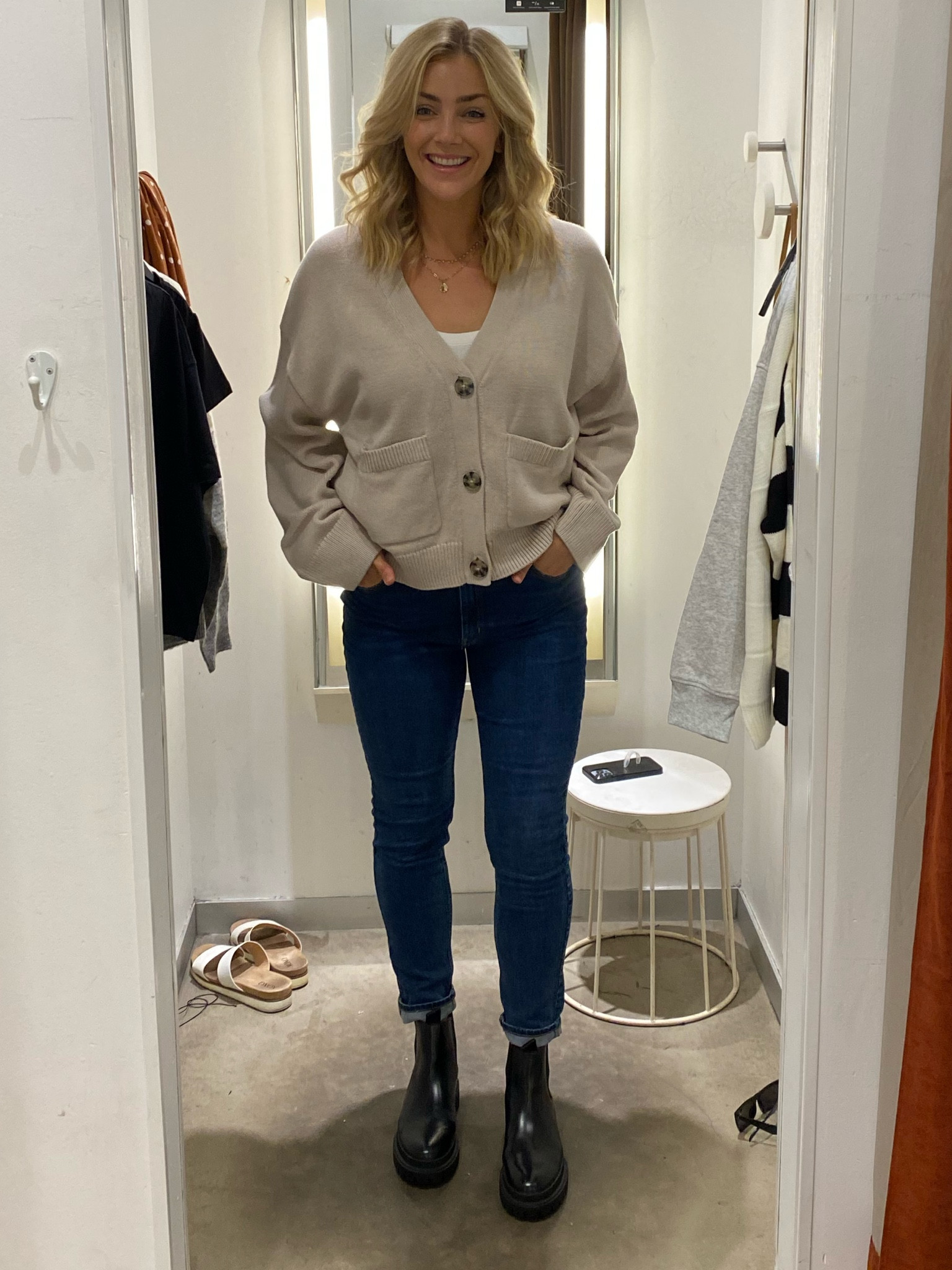 Cardigans make the perfect laying piece for fall. This one has a chunky knit and an slightly oversized fit. 
Jeans: 27
Cardigan: M
Tank: M