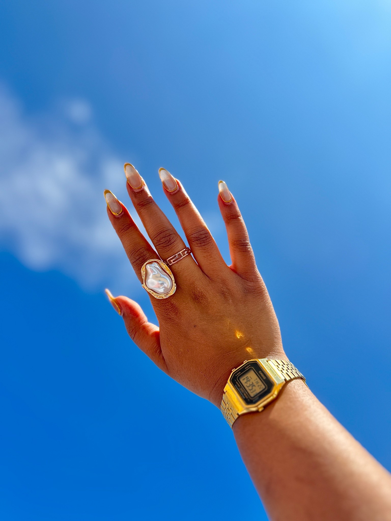 Golden hour details ☀️
You all loved this look on Insta—the statement pearl ring and classic gold Casio watch were such a vibe! Timeless, affordable, and effortlessly chic.
I’ve linked similar ring styles on LTK for anyone looking to elevate their accessories game ✨

#GoldJewellery #StatementRing #CasioWatch #LTKFinds #LTKStyle #AffordableLuxury #EverydayJewels #JewelleryDetails #LTKJewelry #MinimalStyle

#LTKluxury #LTKAroundTheWorld #LTKuk