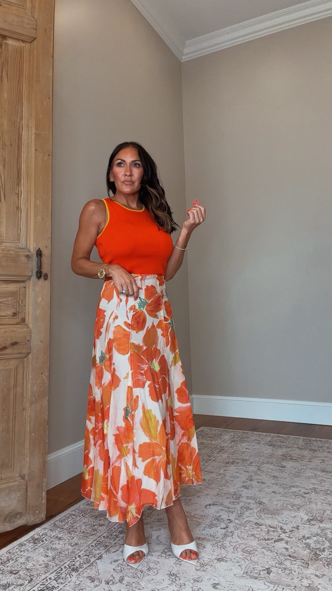 This outfit feels like summer in the prettiest way. The bold floral skirt, the pop of orange, and the white heels somehow make a statement while still feeling effortless.

Proof that getting dressed over 40 doesn’t have to mean playing it safe. If the outfit makes you smile, wear it.

Wearing my typical XS/Small.

5’2” • 130 lbs • 25” waist • 34DD

#Over40Style #PetiteFashion #SummerStyle #AmazonFashion #VacationStyle