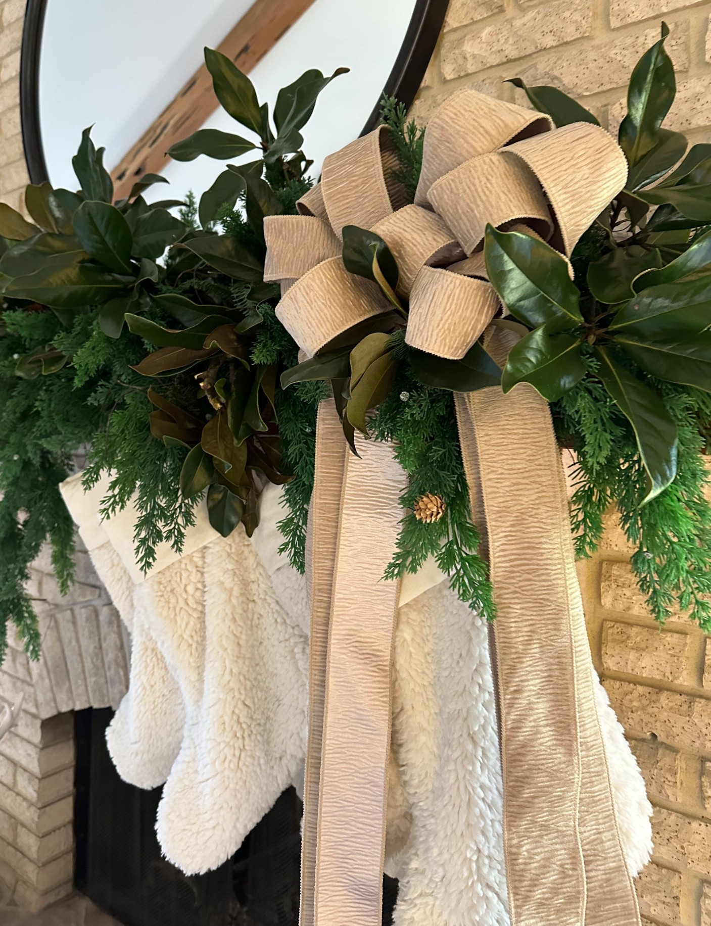 added a single roll of $7 ribbon and magnolia from my parents backyard to update my mantle look | Amazon find | $6.99 for 10yds | crinkled velvet wired ribbon 

*decent pliability but note it’s not super structured 

Christmas decor doesn’t haven’t to expensive, just intentional

my garland and stockings are over 5+ years old, linked similar 

Amazon find | holiday decor inspo | Christmas mantle inspiration | holiday decorating | Christmas magic 

#LTKSaleAlert #LTKHoliday #LTKHome