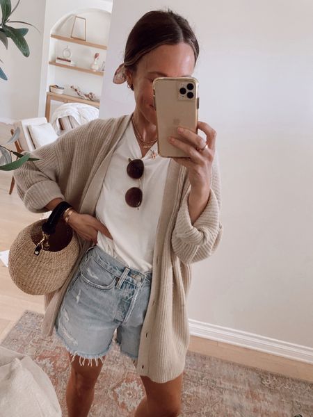 Spring outfit- love pairing cut offs with a cozy oversized cardigan 
Agolde shorts run Tts 
Basic white tee (Tts) 
Oversized cocoon cardigan- SHANNONP15 for 15% off 

#LTKstyletip #LTKsalealert