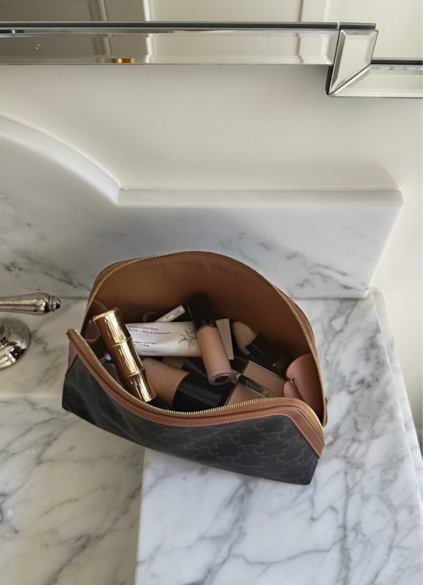 Celine large pouch - use as a makeup bag or sometimes as a clutch or pouch for bags! Everything else I’m loving and using is linked. 