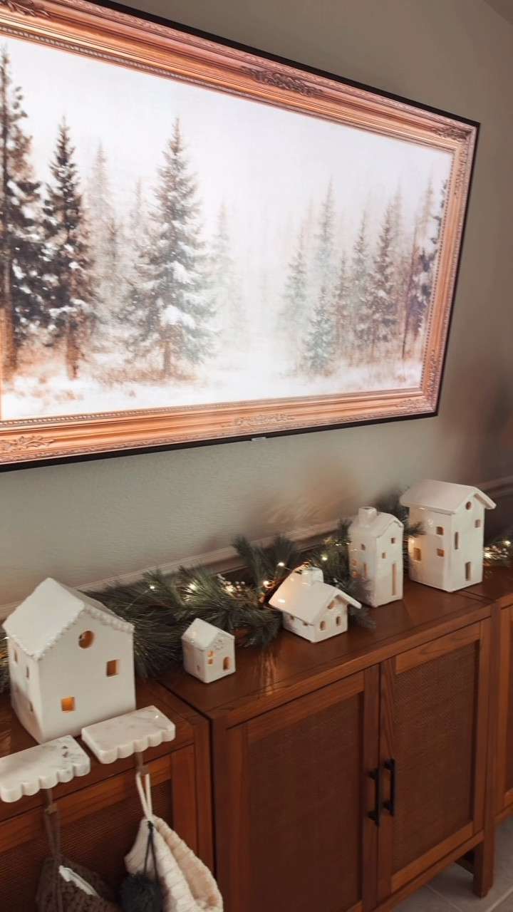 Hey ya’ll . Working on decorating the TV console . I’m definitely keeping it simple . Added my favorite ceramic houses from @potterybarn . Also added a garland & decided to light it up a bit with these LED lights from @target, they’re on sale for 40% off 🙌🏼

#LTKHoliday #LTKSeasonal #LTKHome