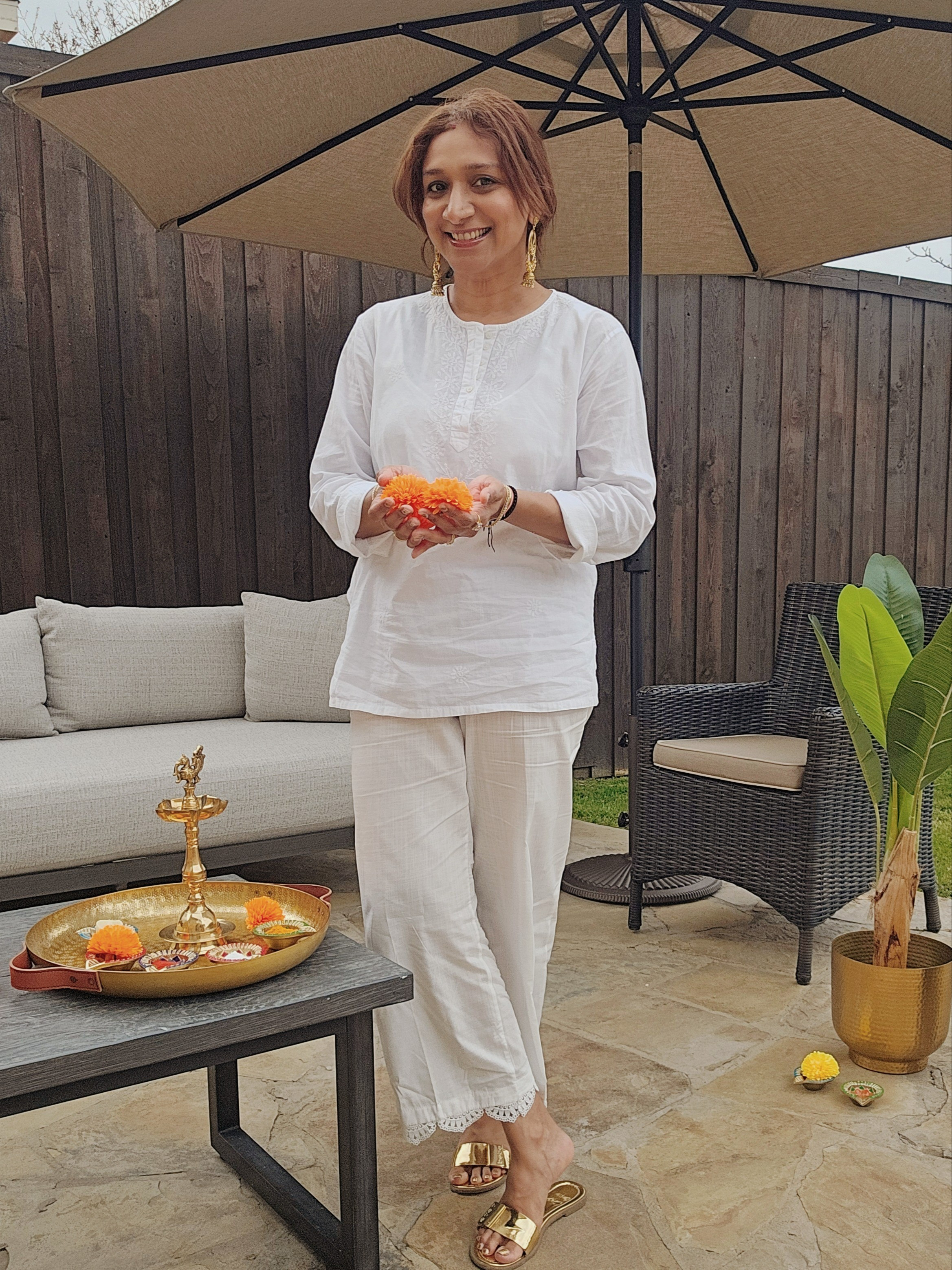 Holi at Home 🌼Sharing the white kurta outfit, gold sandals, and festive decor from my backyard Holi setup.Marigolds, a brass tray, and simple details made it feel special.Perfect if you're looking for a Holi outfit, spring outfit ideas, gold sandals, or festive home decor inspiration.holi outfitwhite kurta setgold sandals womenspring outfit neutralfestive home decormarigold decorindian festive styleoutdoor entertaining

#LTKSpringSale #LTKootd #LTKSeasonal