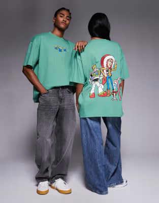 ASOS DESIGN Disney Pixar Christmas Unisex oversized t-shirt with Toy Story prints in green | ASOS (Global)