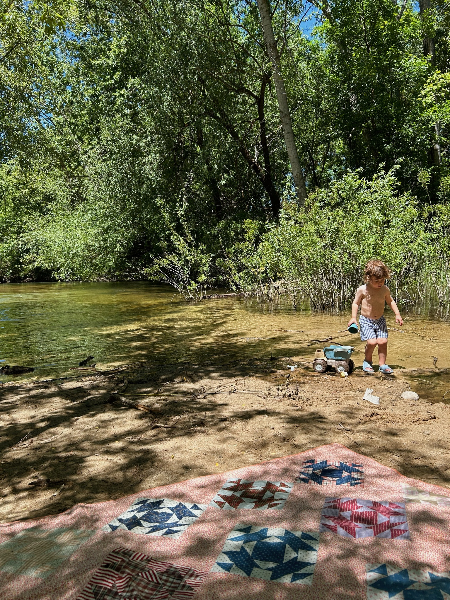 some of our favorite toys to bring to the beach/river 🤍 shep has been loving his truck especially lately!