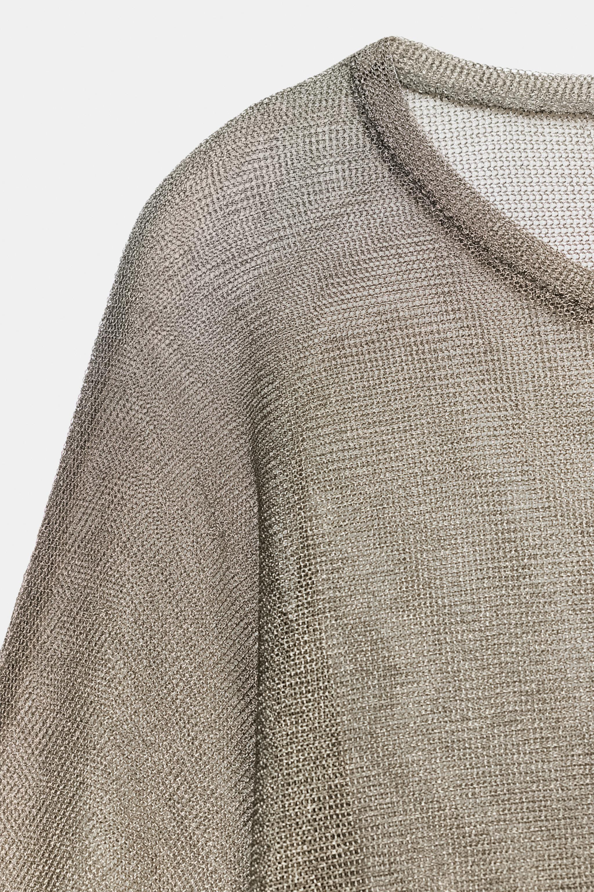 Round neck, long sleeve top. Fabric with metallic thread detail. Straight hem. | Zara US
