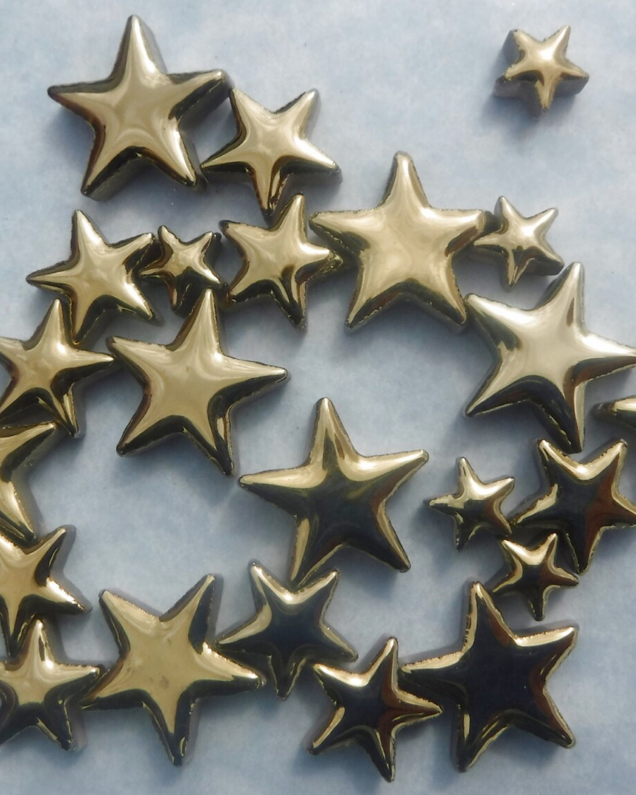 Sharing metallic gold star tesserae for your mosaic art or coffee table decor. ⭐️ For mosaic tips, tutorials, inspiration, and so much more please visit my YouTube channel: YouTube.com/julieweilbacher. Follow @julieweilbacher on Instagram for all things mosaic art. gold star - mosaic - summer vibes - star art - mosaic art - metallic gold decor - crafts night - craft supplies - mosaics

#LTKFindsUnder50 #LTKHome