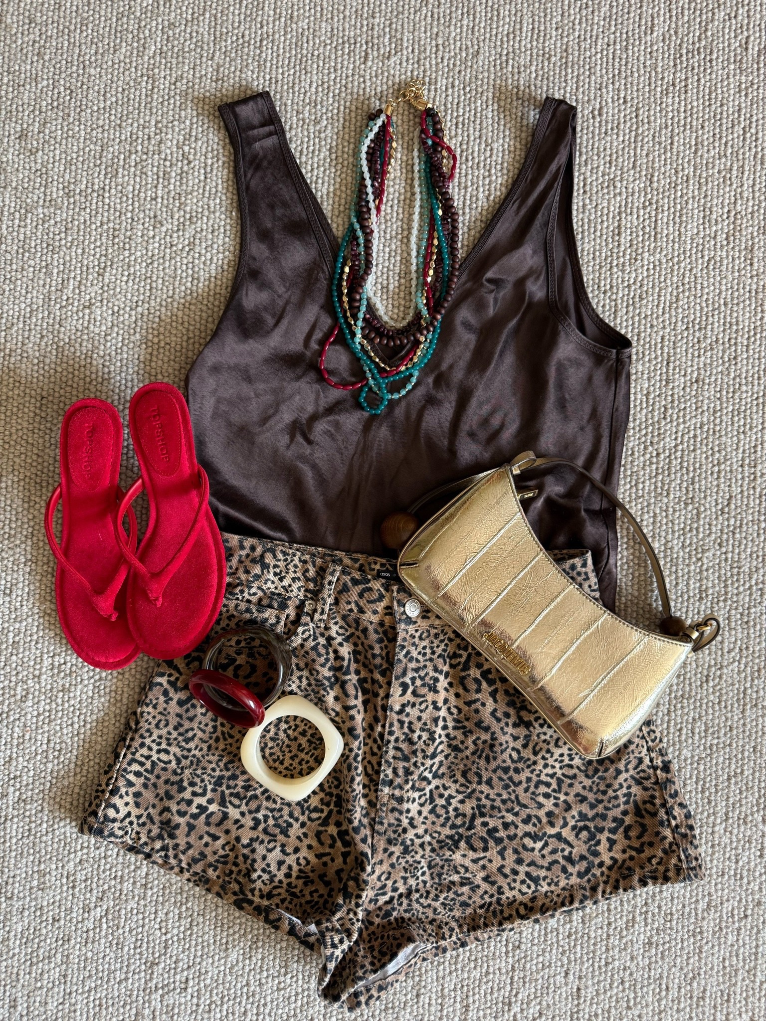 Exact products that I can’t link - 
Top is old Jaki
Shorts are old ASOS
Bag is Jacquemus past season