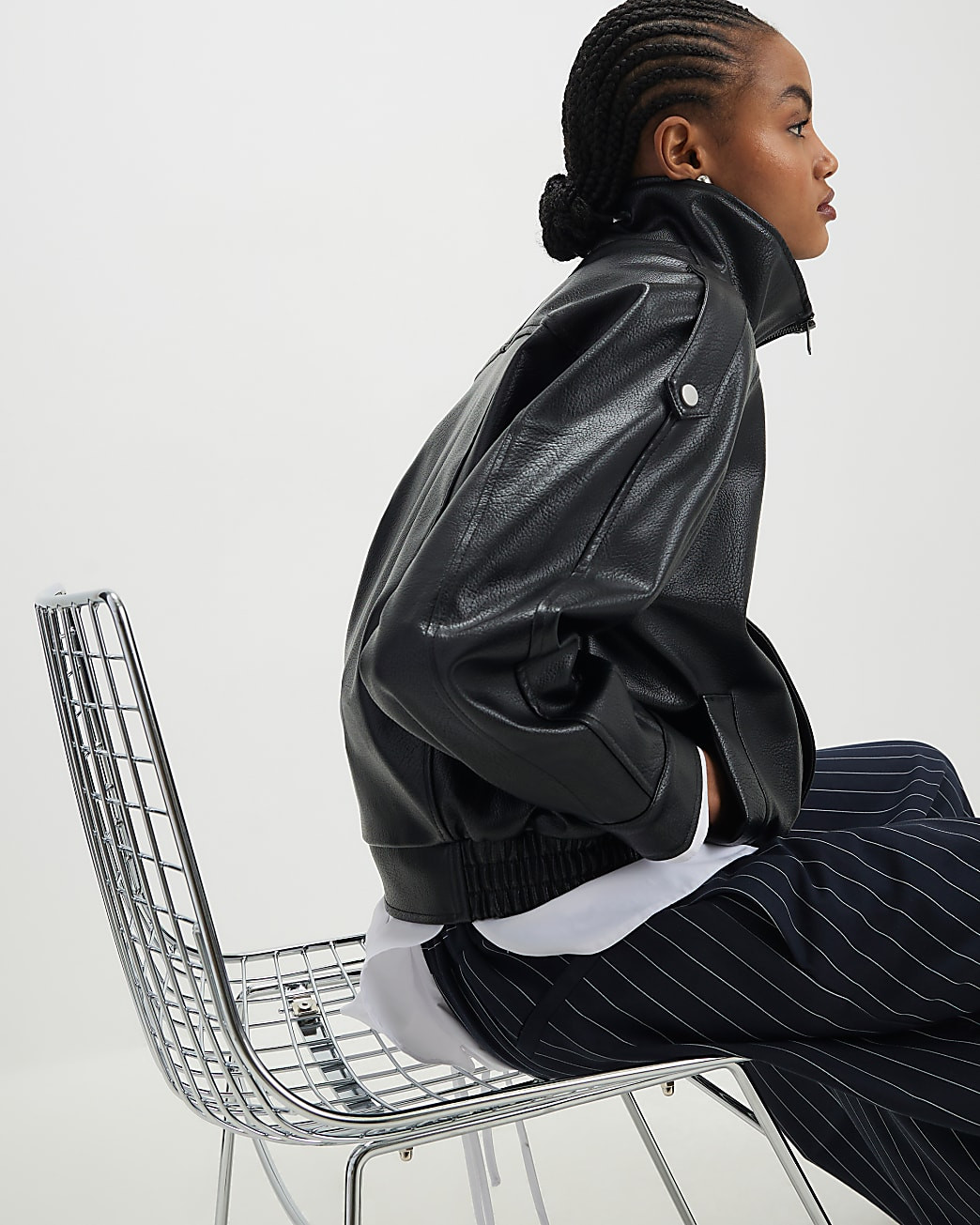 Black Faux Leather Funnel Neck Biker Jacket | River Island UK & IE