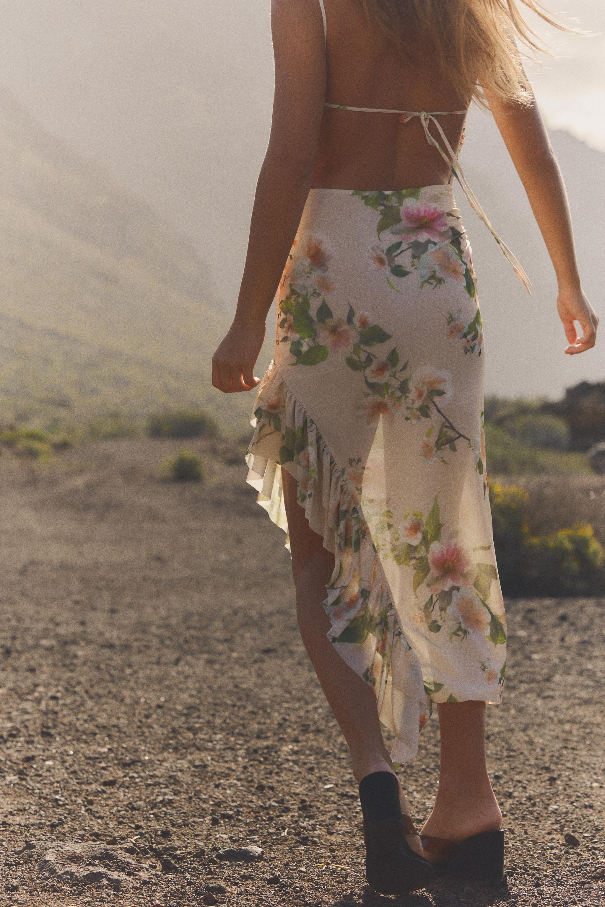 Midi dress with a straight neckline and spaghetti straps. Open back with adjustable strap. Asymme... | Zara US