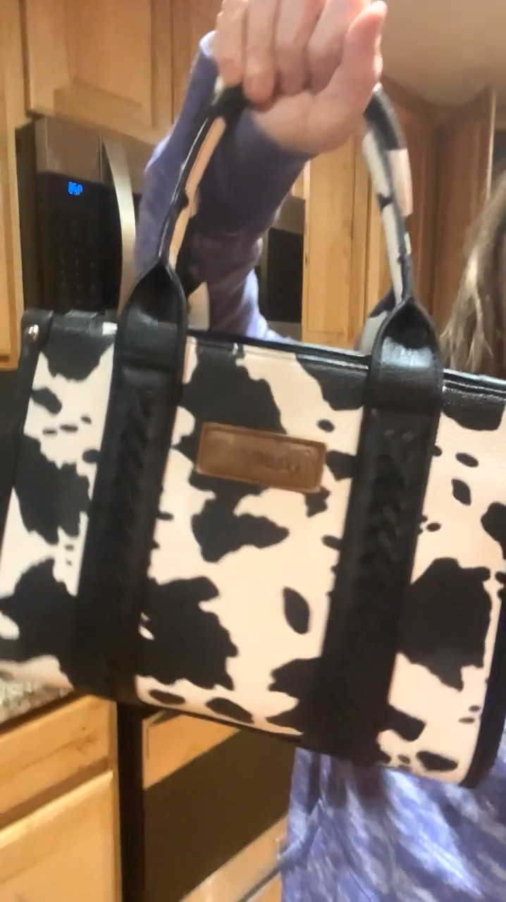All time favorite cow print purse. Wrangler brand. Came with an extra strap that is all cow print! Gifts for her, gift guide, cow lovers, purse, accessories, gifts for wife. 

#LTKGiftGuide #LTKSaleAlert #LTKFindsUnder50